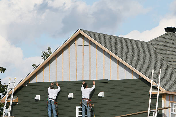 Professional Siding technician working in Somerville, MA